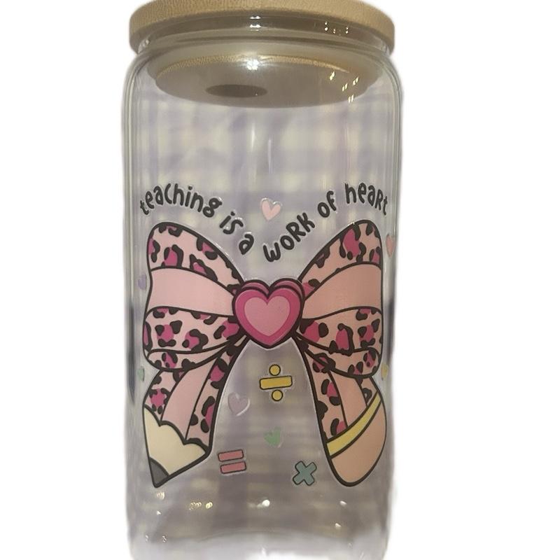 16 Oz Glass Teacher Tumbler with "Teaching Is a Work of Heart" Design and Pink Bow